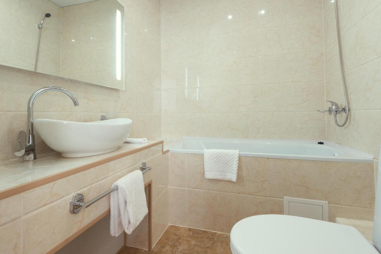 Come Inn Astana Buitenkant foto